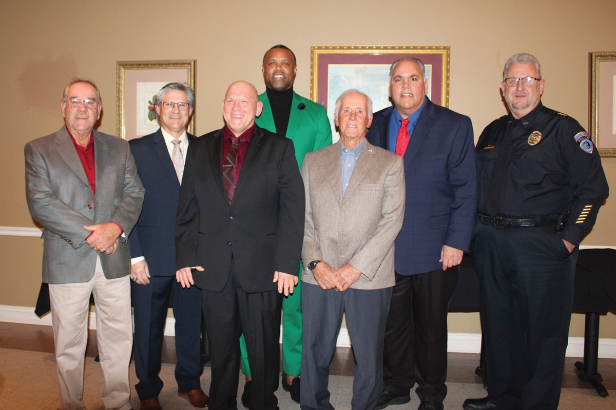 Elected officials and department leadership of the City of Rayne standing together at City Hall.